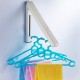 Creative Wall Mounted Retractable Foldable Clothes Rack Magic Hanger Storage Holder